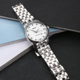 Shop Authentic Mido Baroncelli III Automatic Diamonds White Dial Silver Steel Strap Watch For Women - M7600.4.66.1 - Luxxuri