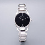  Shop Authentic Calvin Klein Dainty Black Dial Silver Steel Strap Watch for Women - K7L23141 - Luxxuri