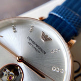  Shop Authentic Emporio Armani Gianni T-Bar Analog Silver Dial Blue Leather Strap Watch For Women - AR60020 - Luxxuri