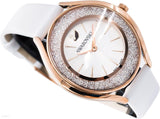  Shop Authentic Swarovski Crystalline Aura Silver Dial White Leather Strap Watch for Women - 5519453 - Luxxuri