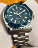  Shop Authentic Gucci Dive Analog Blue Dial Silver Steel Strap Watch For Men - YA136203 - Luxxuri