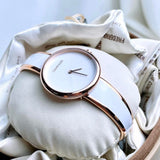  Shop Authentic Calvin Klein Seduce White Dial Two Tone Steel Strap Watch for Women - K4E2N616 - Luxxuri