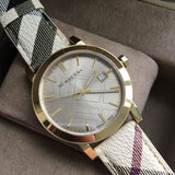  Shop Authentic Burberry The City Gold Dial Haymarket Brown Leather Strap Watch for Women - BU9026 - Luxxuri