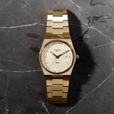  Shop Authentic Tissot PRX Champagne Yellow Gold Dial Gold Steel Strap Watch for Men - T137.410.33.021.00 - Luxxuri
