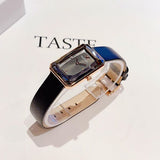  Shop Authentic Swarovski Uptown Black Dial Black Leather Strap Watch for Women - 5547710 - Luxxuri