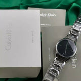  Shop Authentic Calvin Klein Stately Black Dial Silver Steel Strap Watch for Women - K3G23121 - Luxxuri
