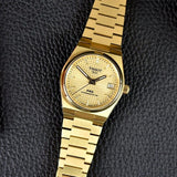  Shop Authentic Tissot PRX Powermatic 80 Gold Dial Gold Steel Strap Watch for Men - T137.207.33.021.00 - Luxxuri
