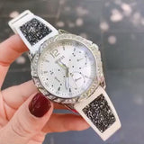  Shop Authentic Guess Swirl Quartz Silver Dial White Silicone Strap Watch for Women - W1096L1 - Luxxuri
