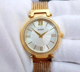  Shop Authentic Guess Soho Champagne Dial Stainless Steel Mesh Bracelet Watch For Women - W0638L2 - Luxxuri