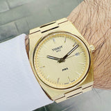  Shop Authentic Tissot PRX Champagne Yellow Gold Dial Gold Steel Strap Watch for Men - T137.410.33.021.00 - Luxxuri