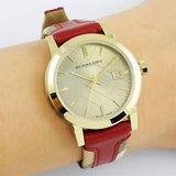  Shop Authentic Burberry Heritage Nova Gold Dial Haymarket Red Leather Strap Watch for Women - BU9111 - Luxxuri