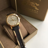  Shop Authentic Burberry The City Gold Dial Black Leather Strap Watch for Men - BU9032 - Luxxuri