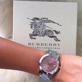  Shop Authentic Burberry The City Pink Dial Silver Steel Strap Watch for Women - BU9124 - Luxxuri