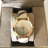  Shop Authentic Burberry The City Gold Dial Haymarket Brown Leather Strap Watch for Women - BU9026 - Luxxuri