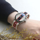  Shop Authentic Gucci G Timeless Quartz White Dial Two Tone NATO Strap Watch For Men - YA1264071 - Luxxuri