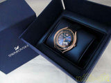  Shop Authentic Swarovski Crystalline Aura Blue Dial Blue Leather Strap Watch for Women - 5519447 - Luxxuri