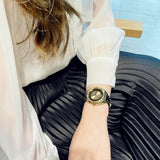  Shop Authentic Versace Shadov Quartz Gold Dial Black Leather Strap Watch for Women - VEBM01118 - Luxxuri